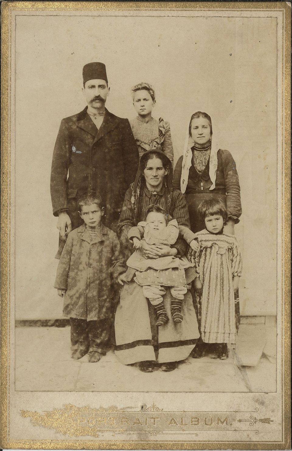 Photograph of Dikran Asarian from Sivas and six members of his family, all bound for America. May 21, 1906. Courtesy of Başbakanlık Osmanlı Arşivleri (Prime Ministry Archives, Istanbul)